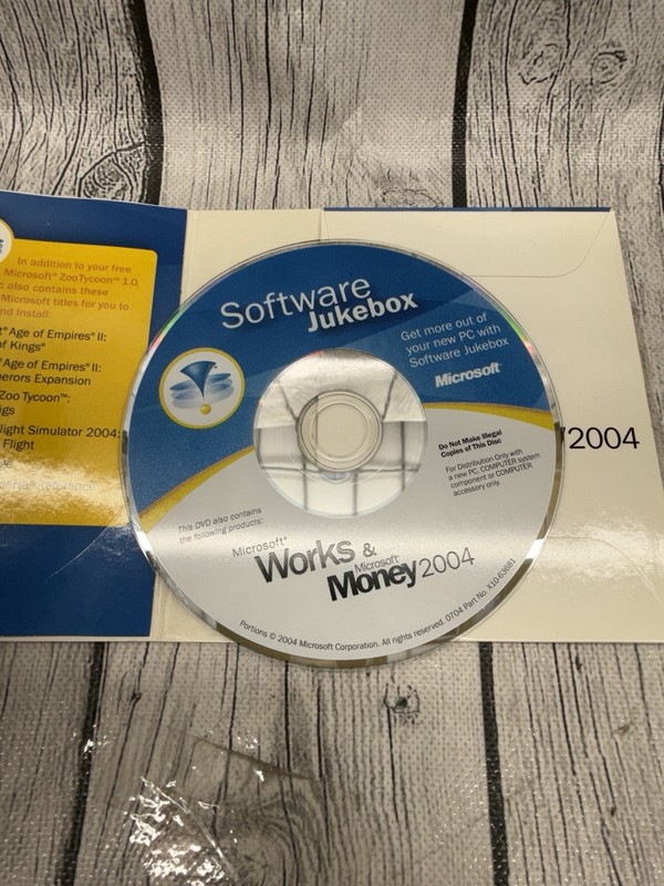 Microsoft Works 7.0 and Money 2004 CD-ROM Software Disk With Key gallery
