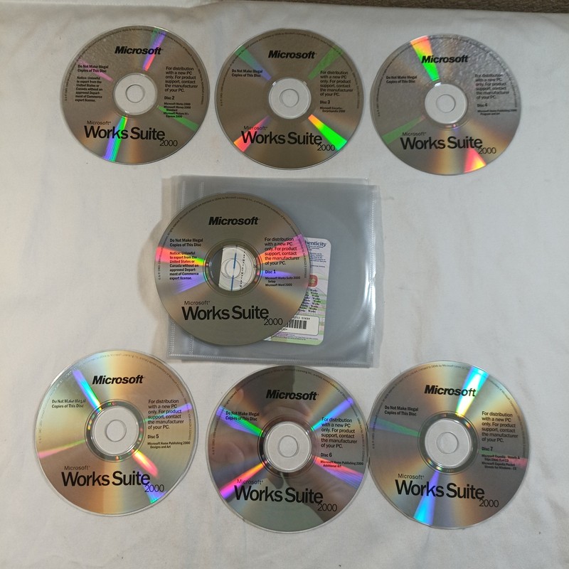 Microsoft Works Suite 2000 – Complete 7 Disc PC CD-ROM Vintage Excellent Conditi