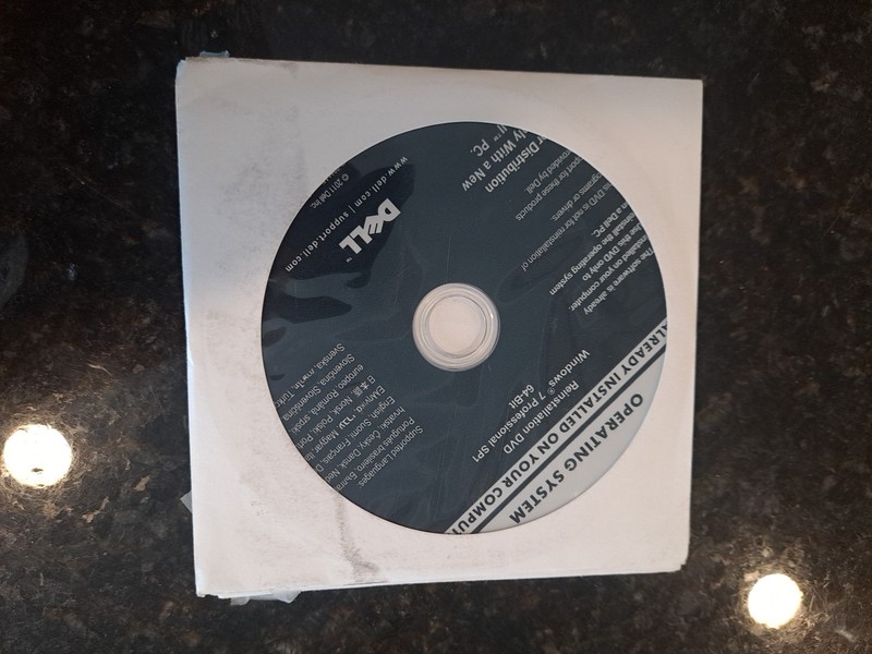 Dell Reinstallation DVD Windows 7 Professional SP1 64-Bit Part No. 0KJX6D