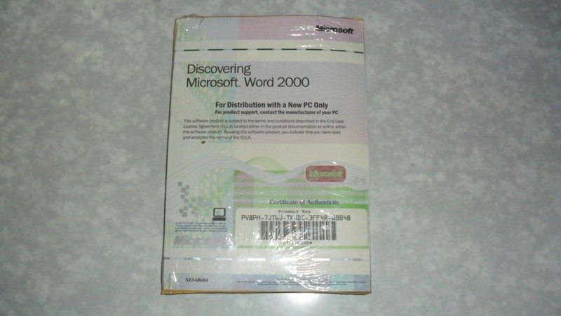 Microsoft works suite 2000 new sealed Disks and Certificate Word, Works, etc.