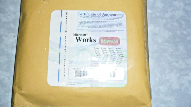 Microsoft works suite 2000 new sealed Disks and Certificate Word, Works, etc. gallery