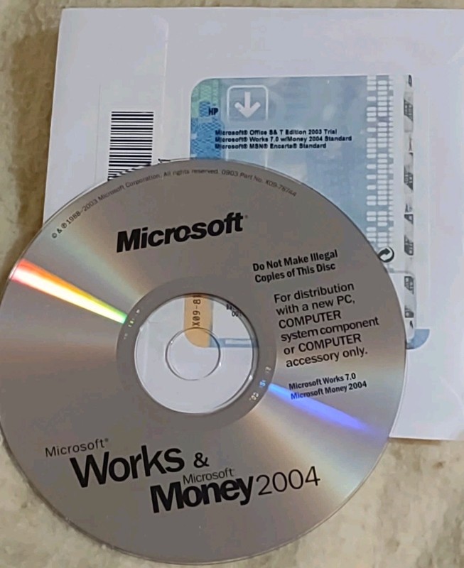 Microsoft Works 7.0 w/Money 2004, MSN Encarta, & MS Office S&T Ed 2003 Trial