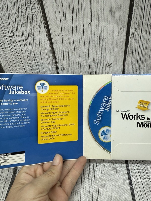 Microsoft Works 7.0 and Money 2004 CD-ROM Software Disk With Key gallery