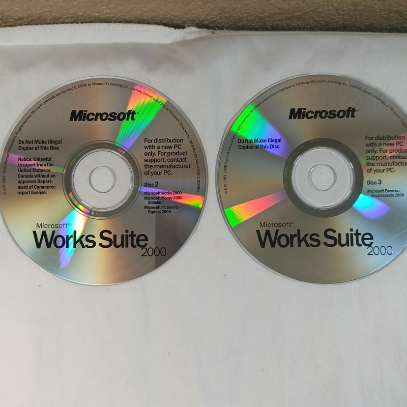 Microsoft Works Suite 2000 - Complete 7 Disc PC CD-ROM Vintage Excellent Conditi gallery