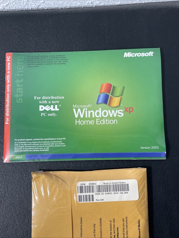 Microsoft Works Suite 2001 New Sealed 6 CDs And DELL Windows XP Home Edition gallery