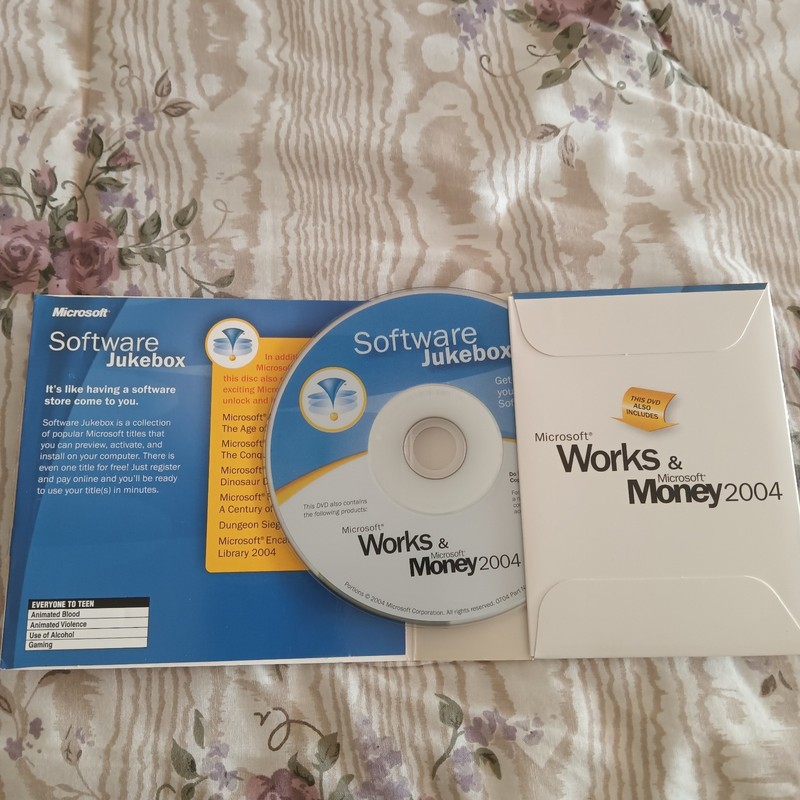 Microsoft Works 7.0 and Money 2004 CD-ROM Software Disk With Key gallery