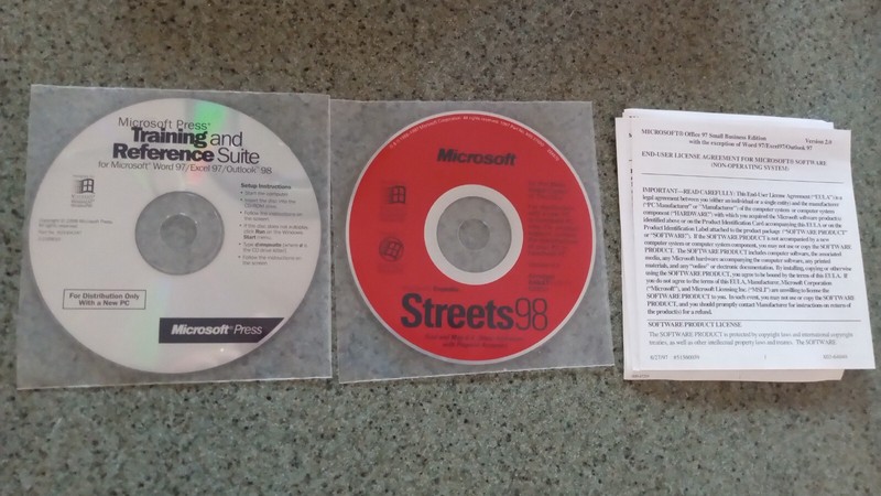 Microsoft Office 97 SMALL BUSINESS EDITION - 4 disc set. Sealed with COA gallery