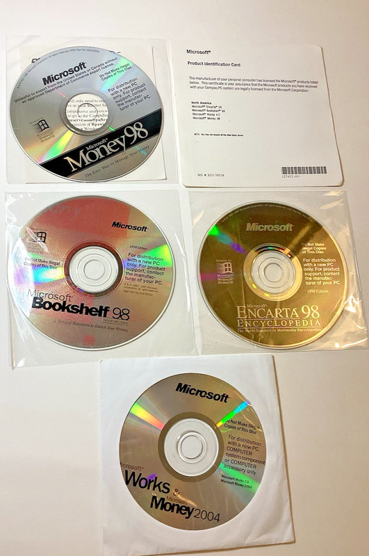 Microsoft Set of 4 Software Discs/Encarta & Bookshelf ’98 + Works & Money 2004