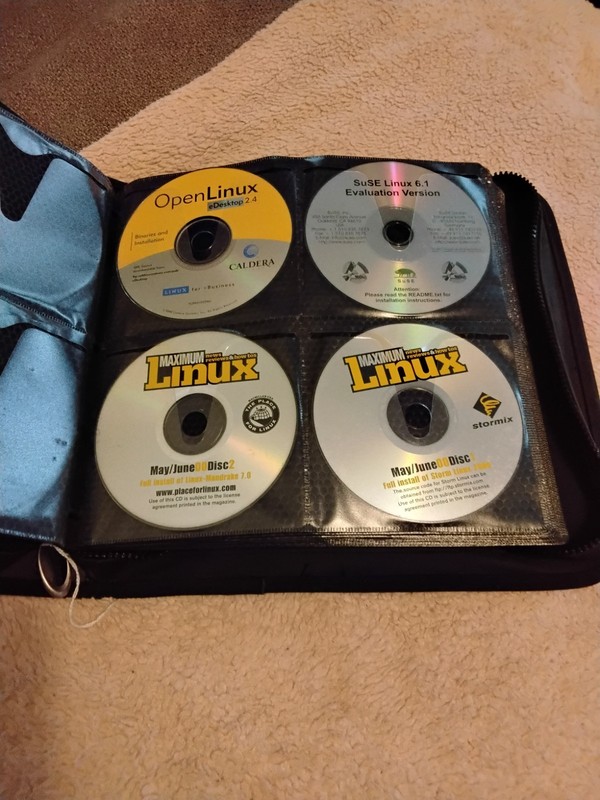 ESTATE SELL OFF- HUGE BINDER FULL OF LINUX CD'S- YOU CHOOSE-PROTECTED- vtg-SAVE$ gallery